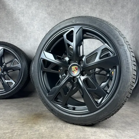 Background image for Winterräder Porsche Taycan J1 21" Original 4S Turbo S Cross Turismo Design Felgen 4S GTS Schwarz DOT24